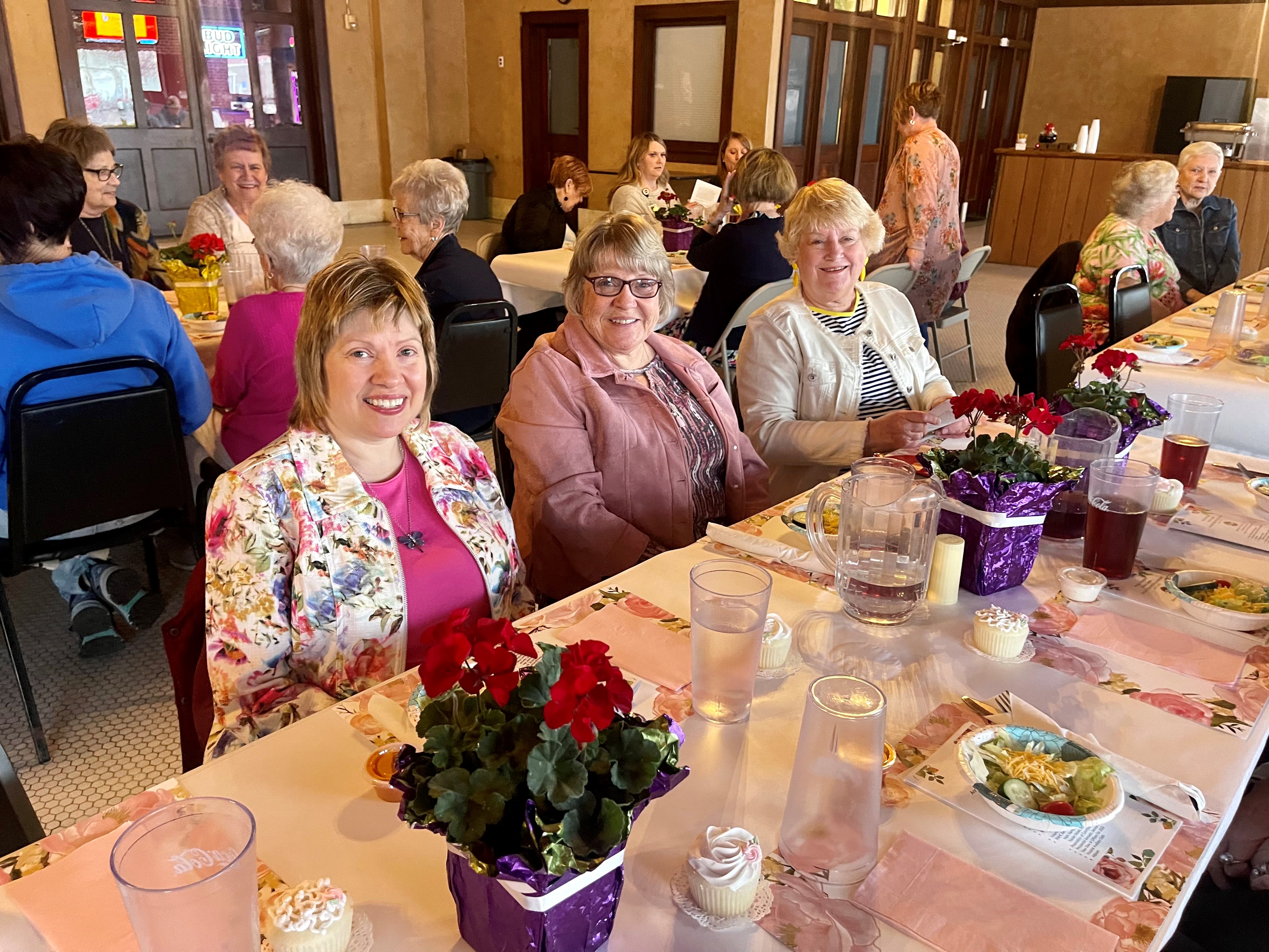 SL members smiling at 2022 SL luncheon