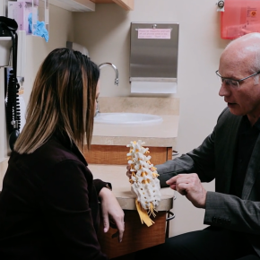 Dr. Fabian discusses spine with patient