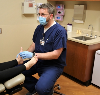 Dr. Carlston, podiatrist, performs foot exam at Phelps Medical Group Holdrege Nebraska