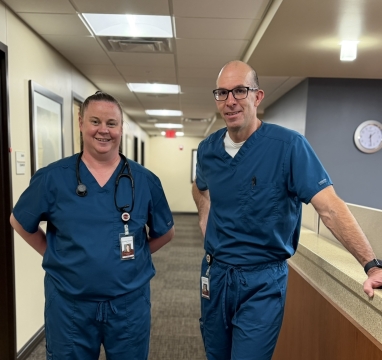 Kendee and Dr. O'Hare in hallway. 